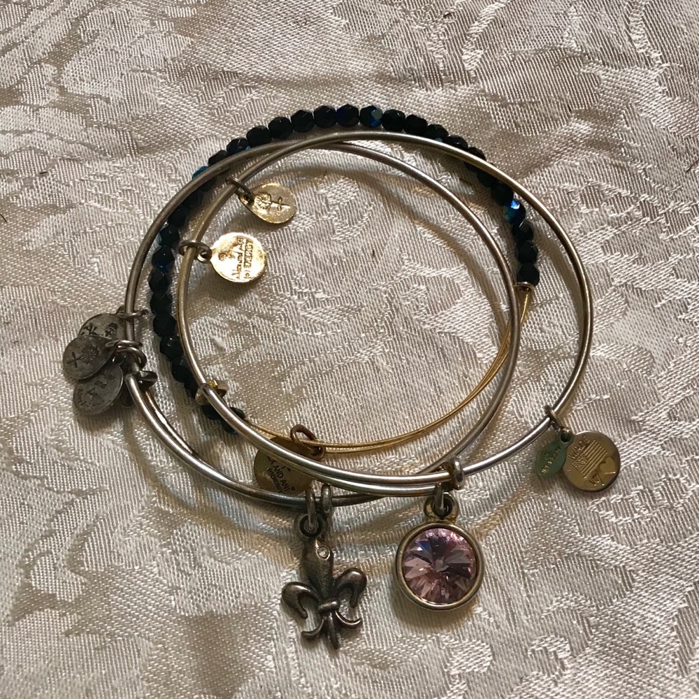 Three Alex and Ani bracelets Fleur de Lis